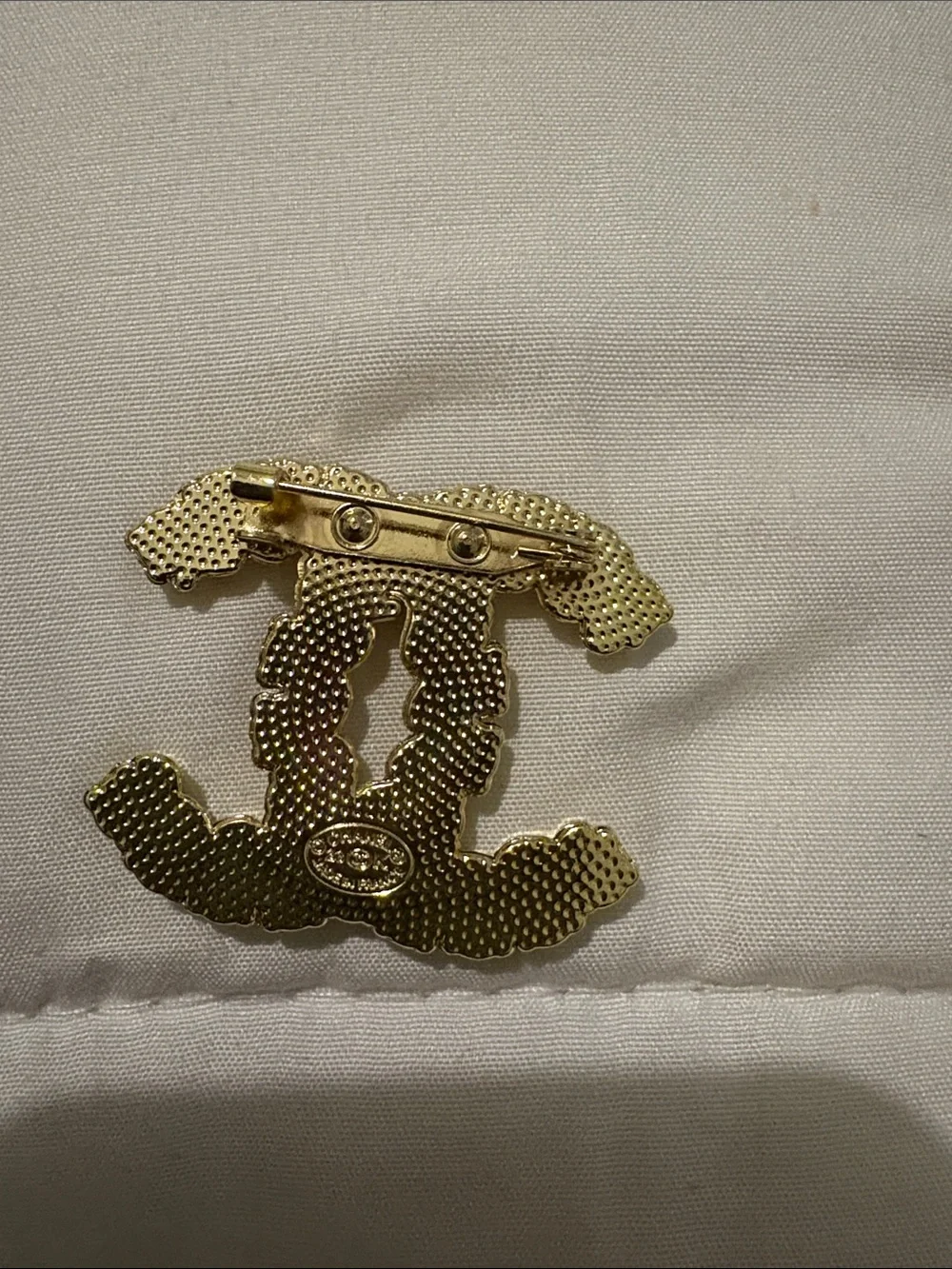 Gold-Tone Pink Crystal Interlocking Logo Brooch